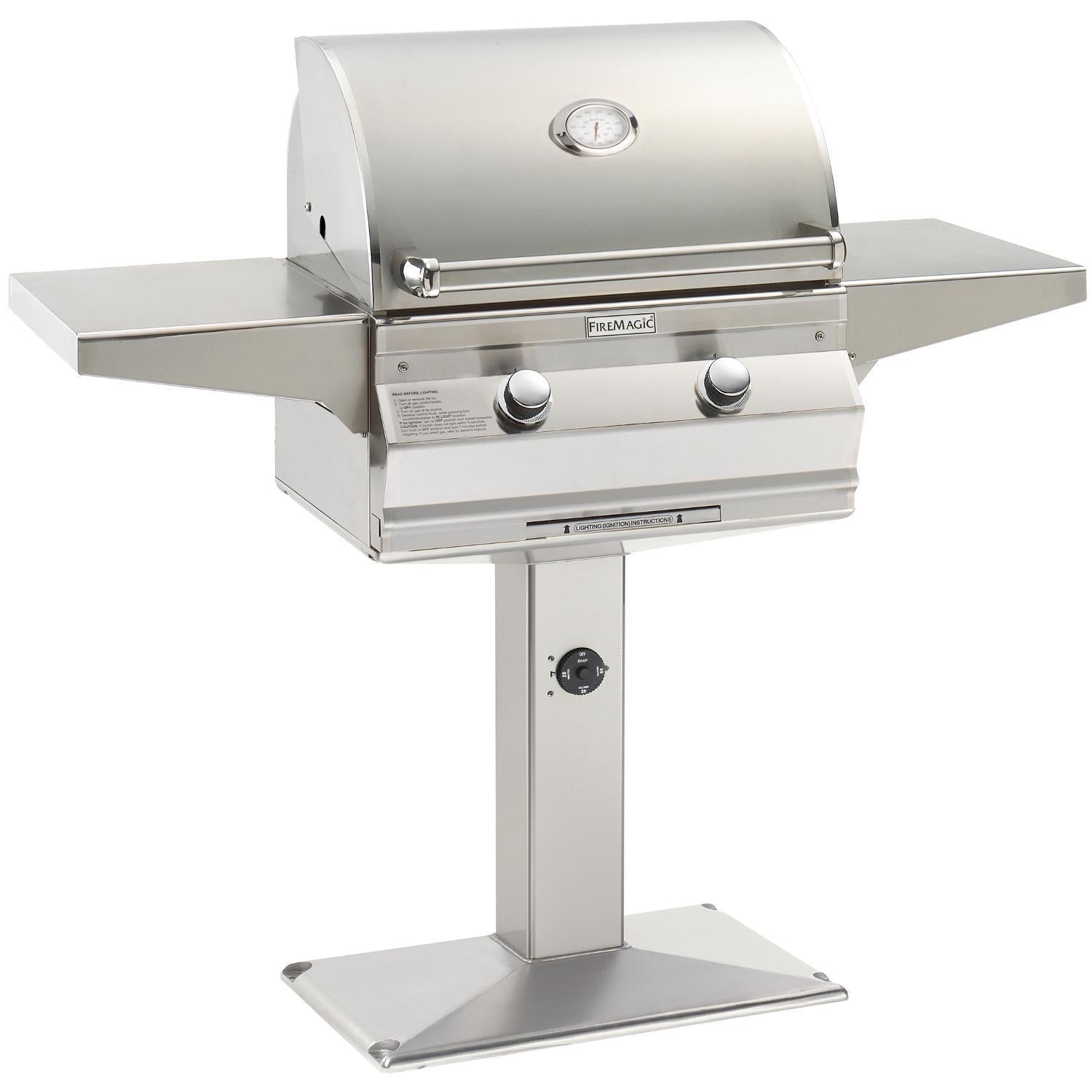 Fire Magic stainless gas grill with lid thermometer and side shelves