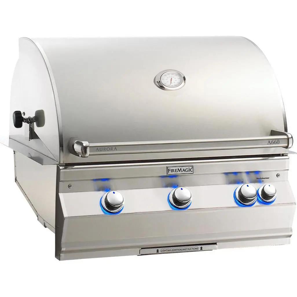 Stainless steel built-in gas grill with hood, analog thermometer, and blue-lit controls