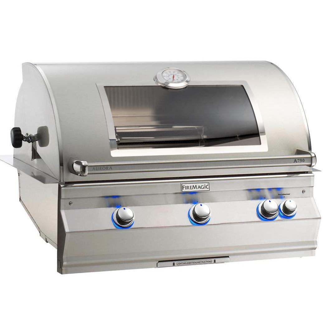 FireMagic built-in natural gas grill with control knobs and analog thermometer