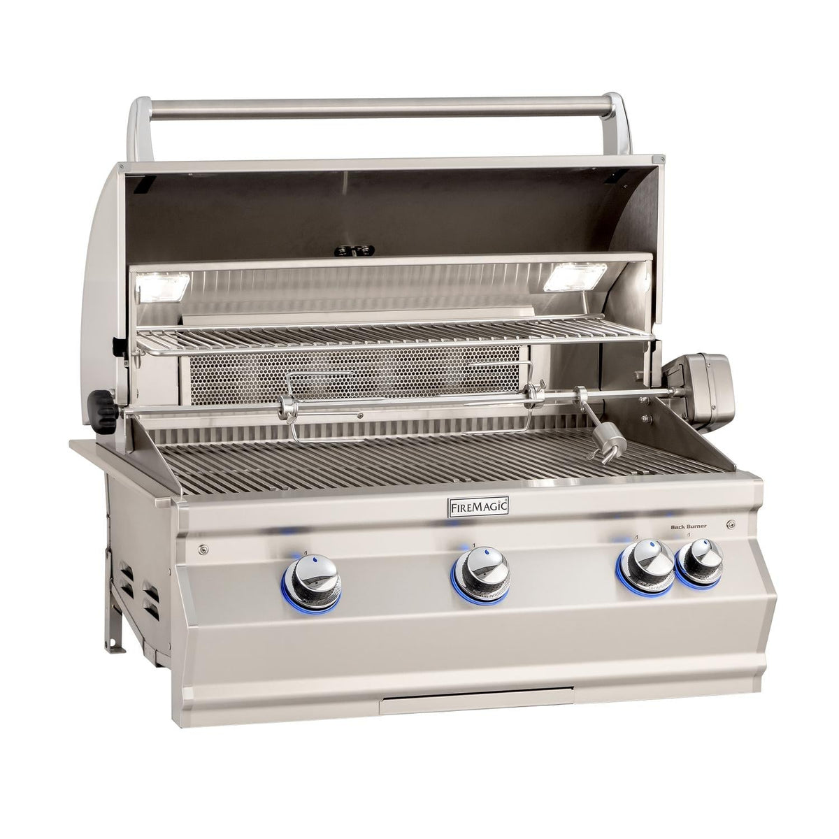 Fire Magic gas grill with open lid, interior cooking grate, and front control knobs