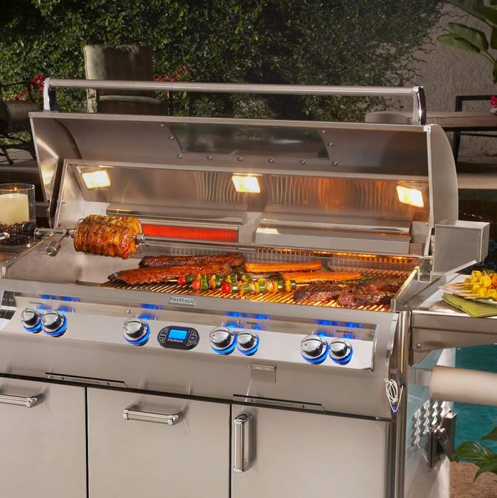 Stainless steel rotisserie kit with spit rod and motor, installed on gas grill