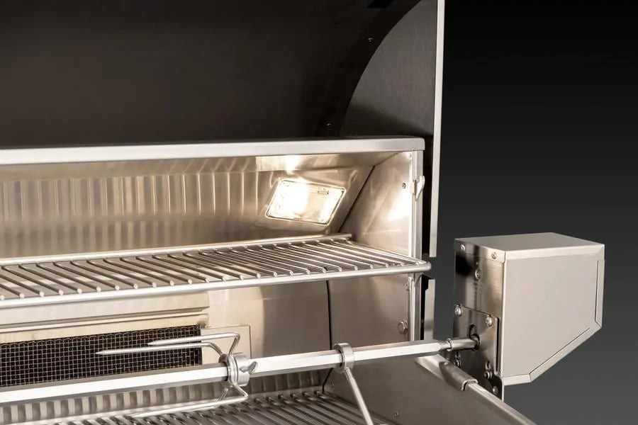 Stainless steel grill firebox with lit burner, cooking grates, and side attachment