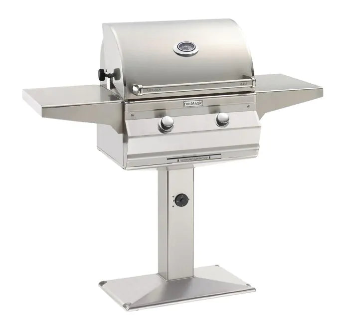 Fire Magic patio gas grill with analog thermometer, stainless lid and two control knobs