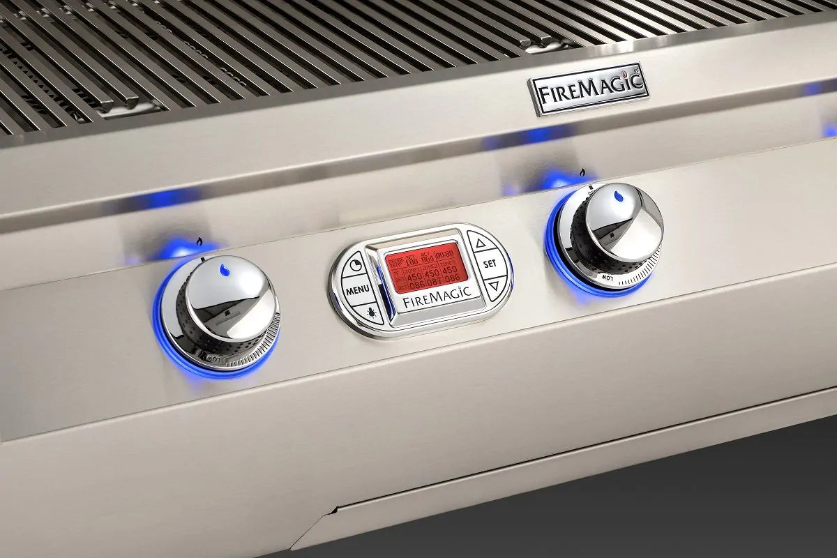 Grill control panel with three knobs, digital thermometer display, and blue LEDs