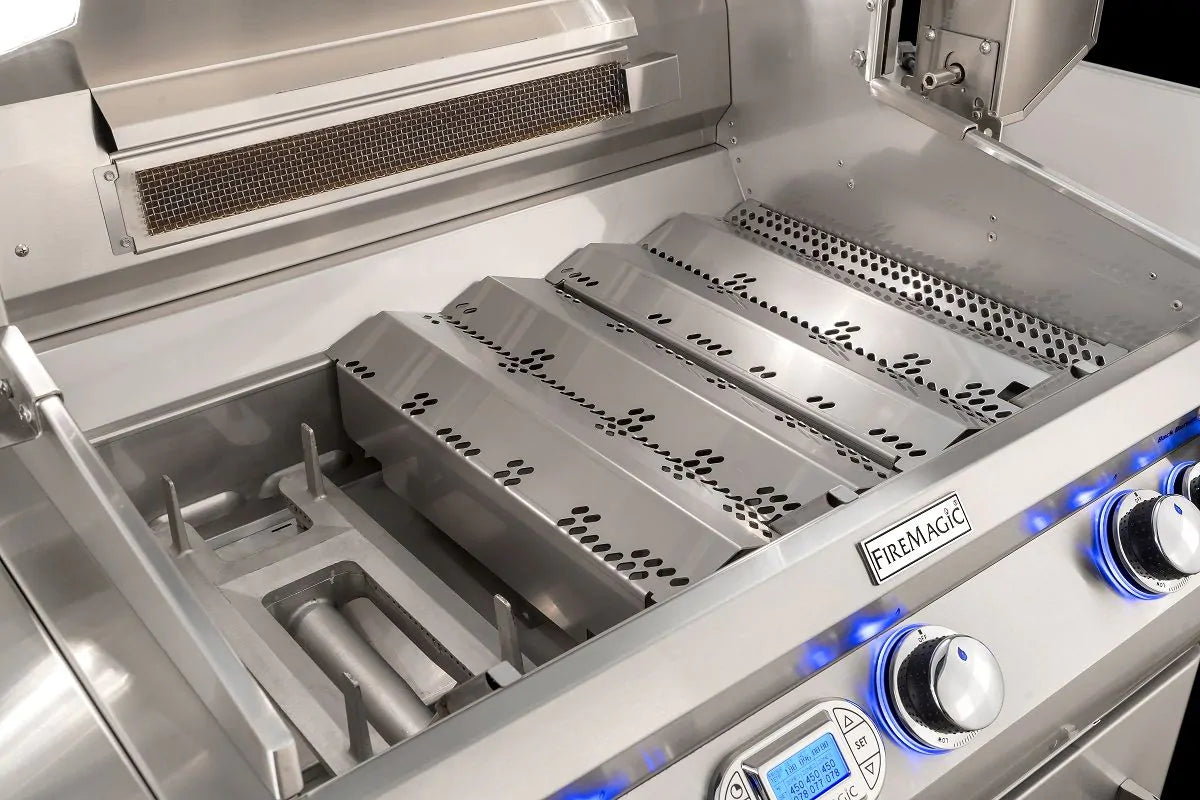 Stainless grill open firebox with flavorizer shields and rod holders