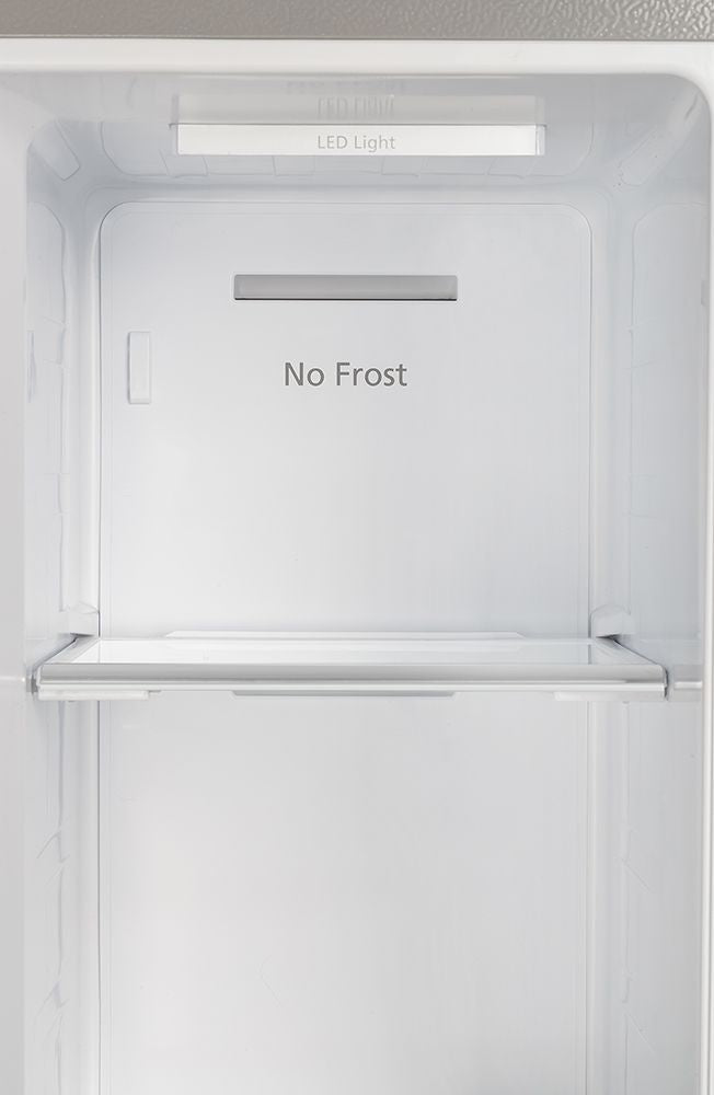 Refrigerator freezer compartment with No Frost label and LED light