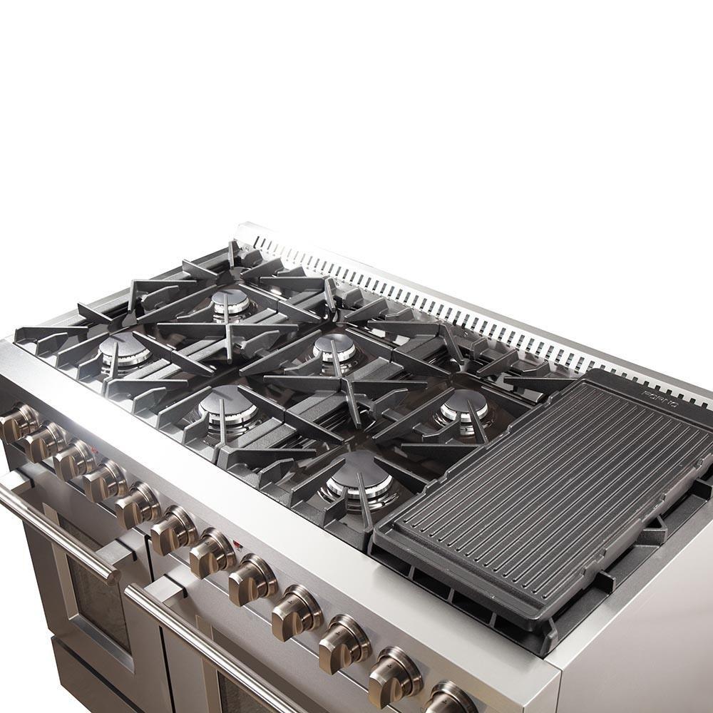 Stainless steel dual fuel range cooktop with cast grates and flat griddle plate.