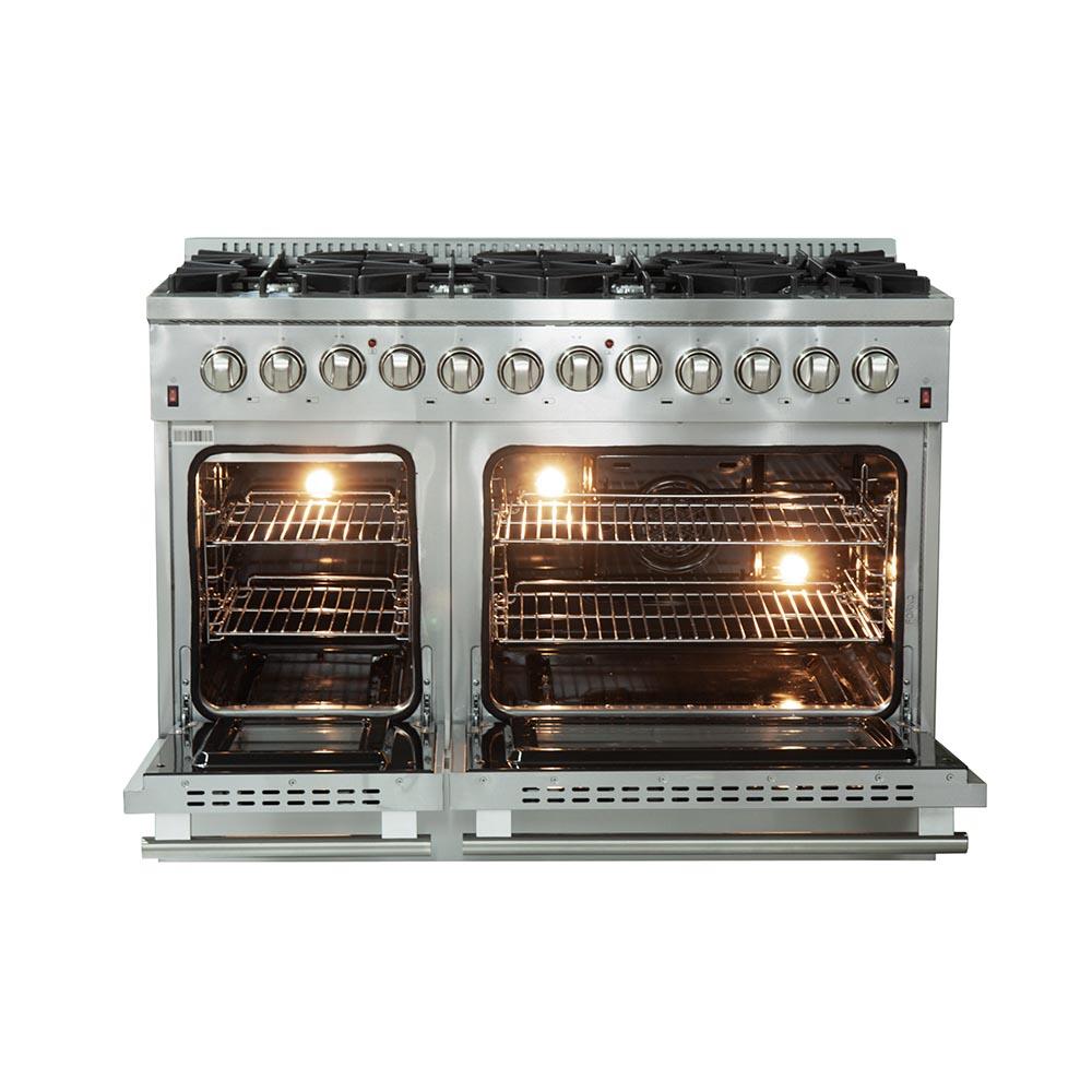 Stainless steel dual fuel range with both oven doors open and interior lights on.