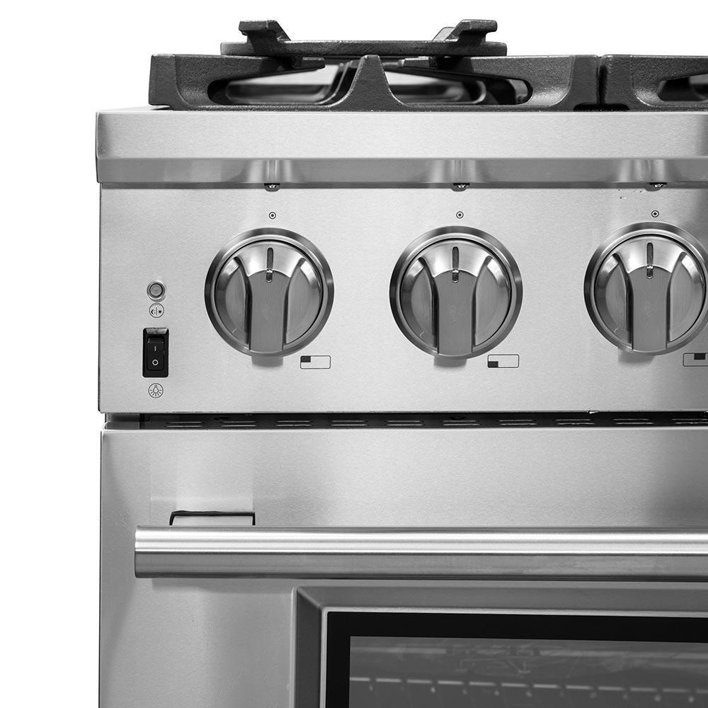 Stainless steel gas range front with three large control knobs and burner grates above.