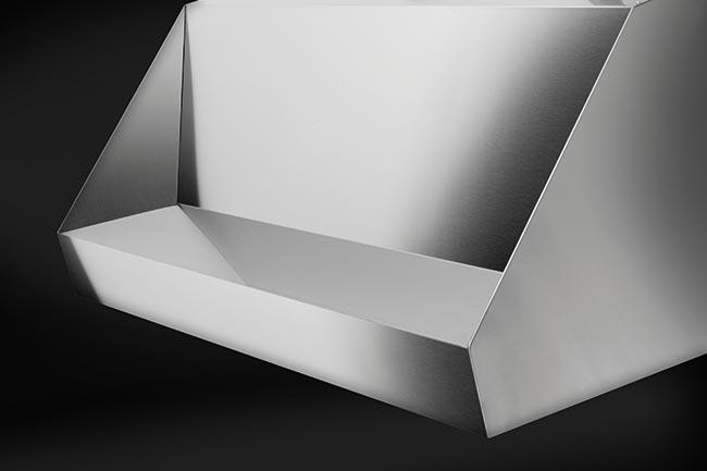 Stainless steel under-cabinet range hood interior with smooth baffle cavity