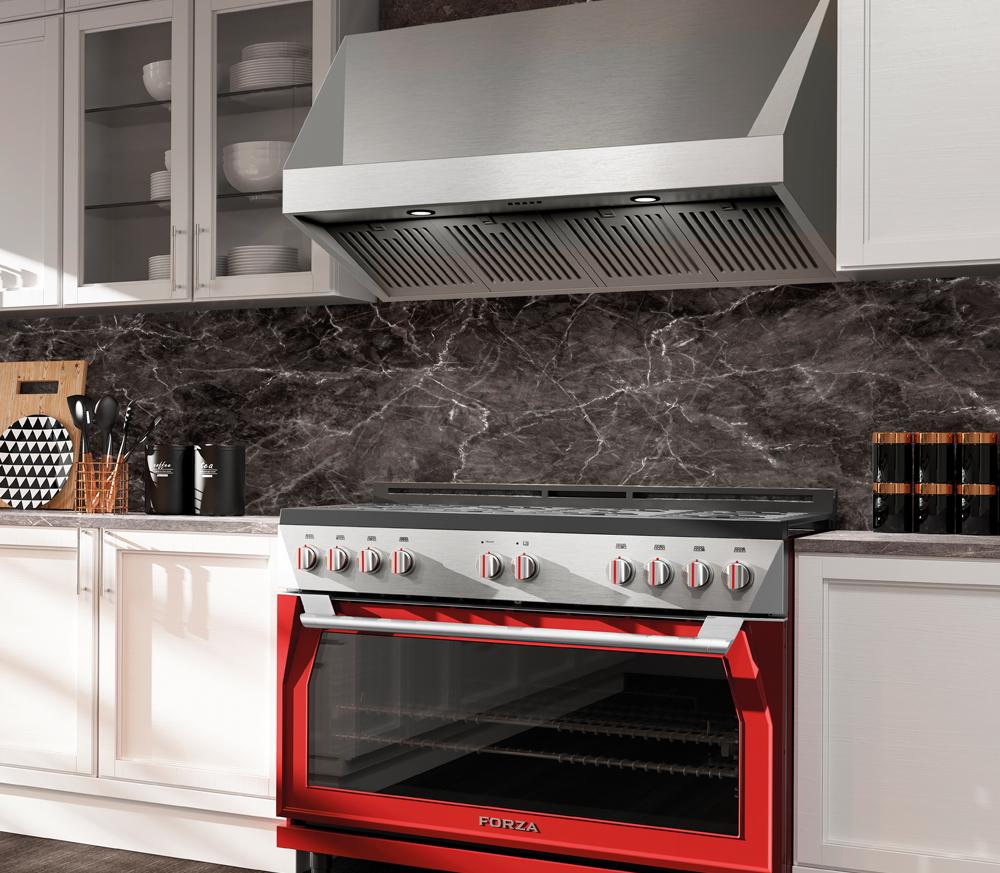Stainless steel range hood canopy with vent slats over an open cooking range