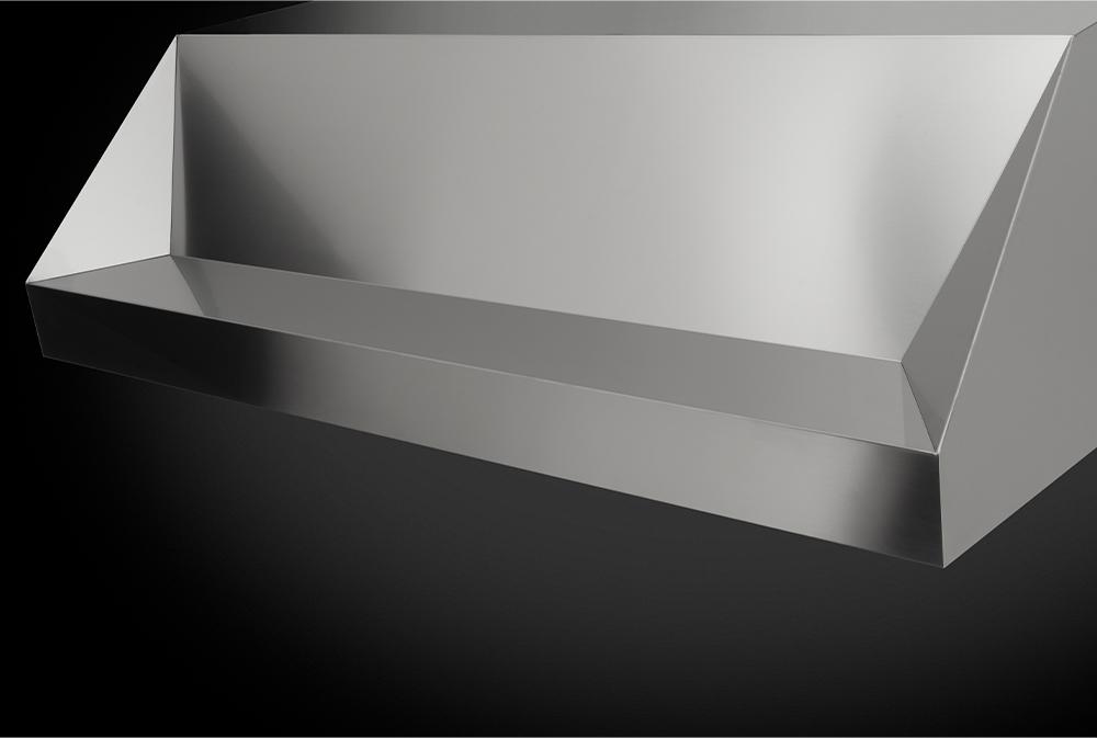 Stainless steel range hood canopy underside with elongated vent grilles