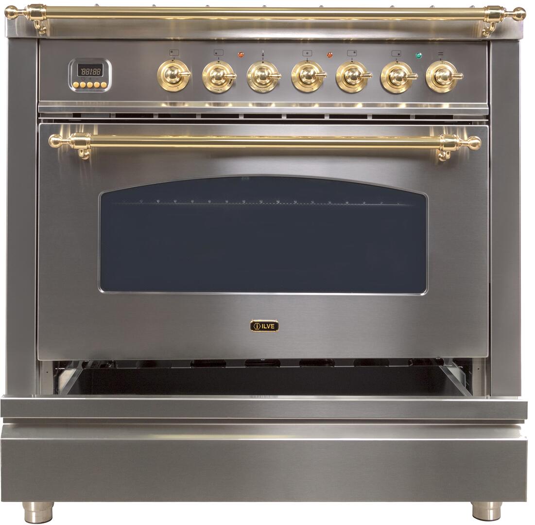 Stainless steel gas range front with brass oven handle, control knobs, and window