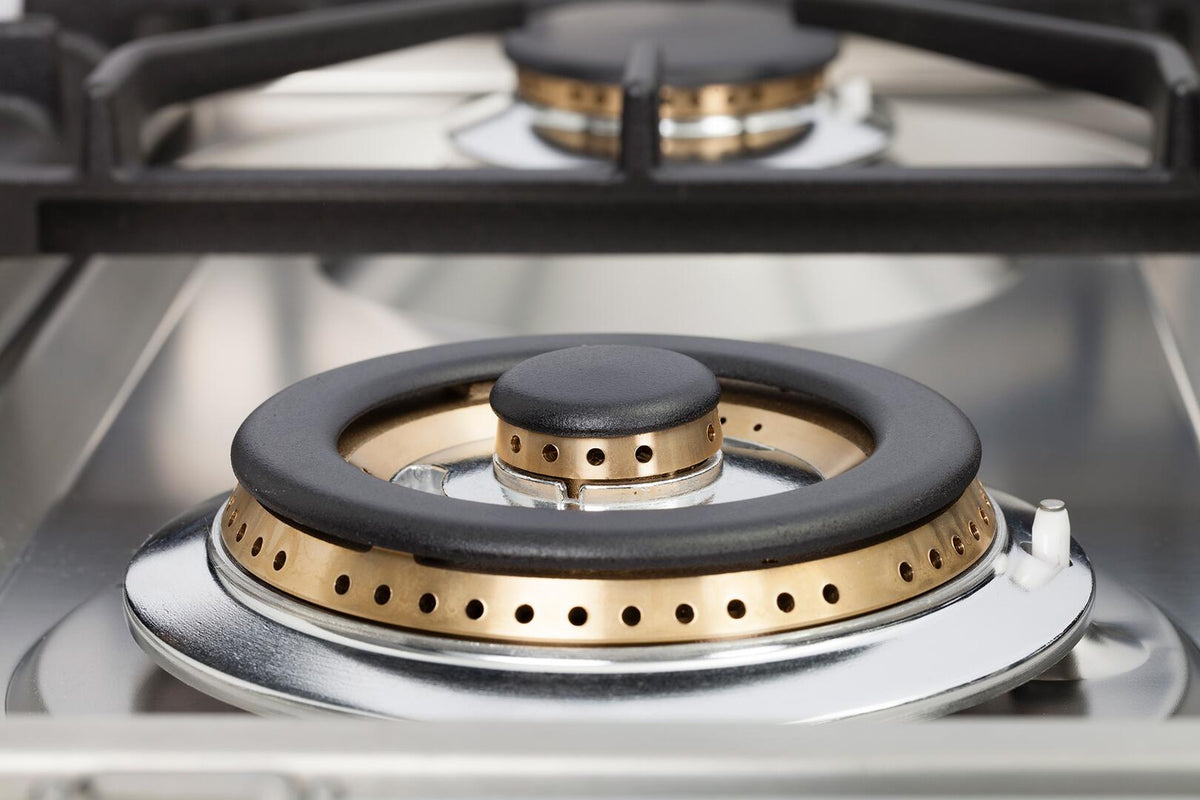 Dual fuel range griddle burner with brass-trim ring and dark burner cap