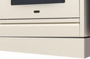 Antique white toe kick panel installed on range front with metallic trim