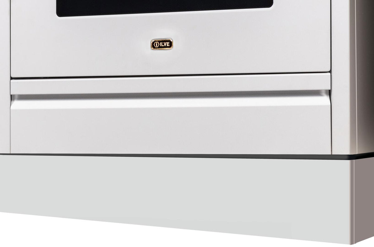 White range toe kick panel under oven door with metal trim