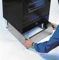 ILVE wrap-around toe kick panel in dark finish, fitted along appliance base