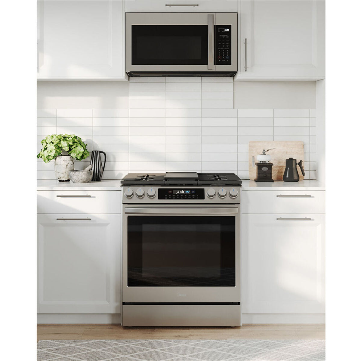 Stainless steel slide-in gas range with five sealed burners and closed oven