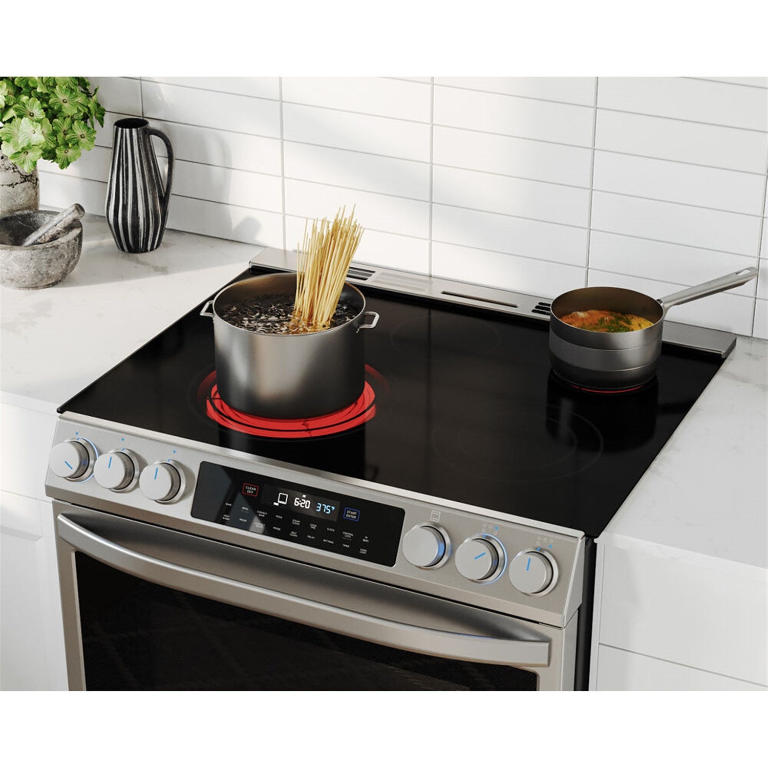 Stainless electric slide-in range with black cooktop, pot boiling and pan cooking
