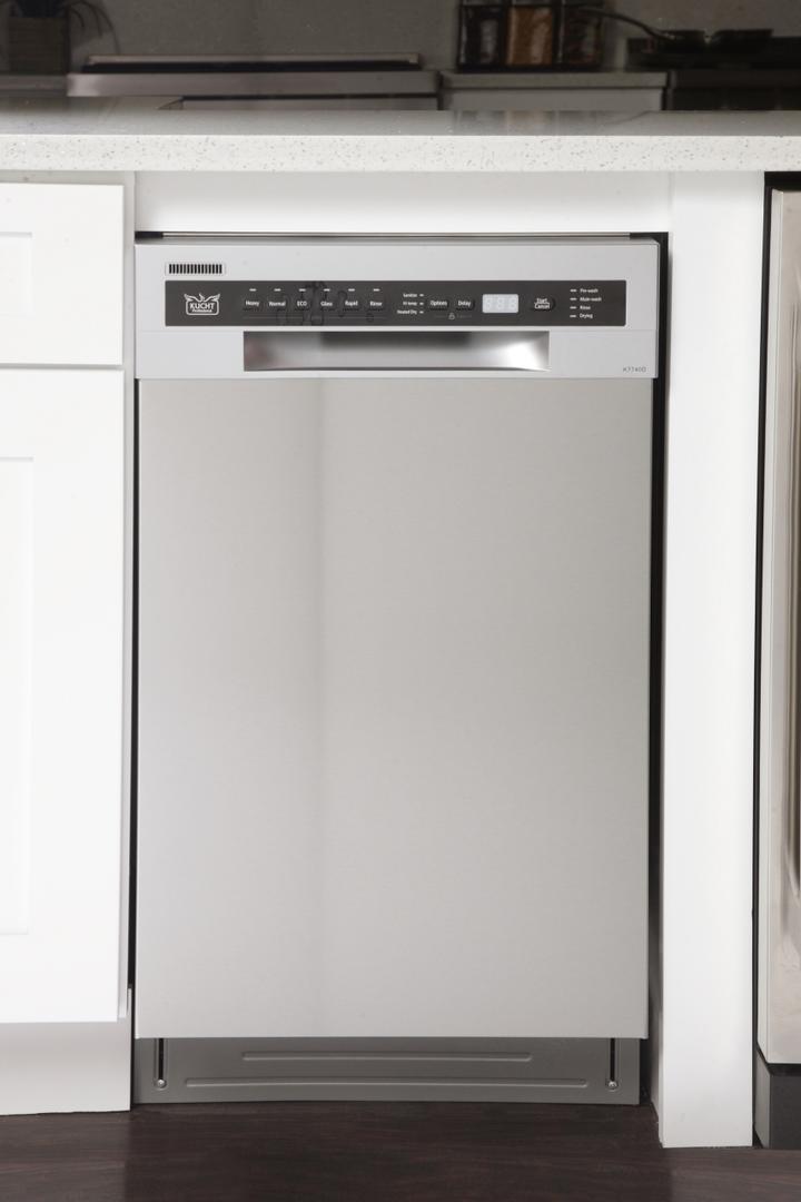 Built-in dishwasher exterior front with stainless control panel and handle