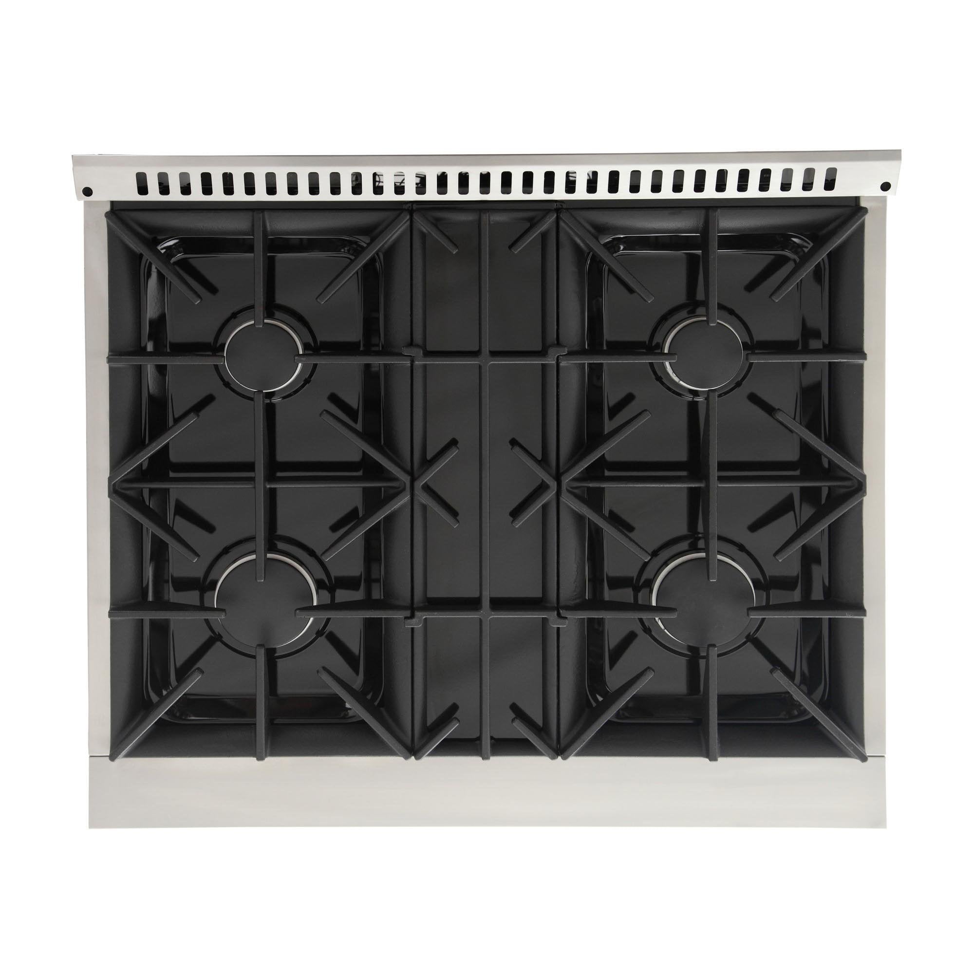 Black burner grates and sealed burner bases on white gas range cooktop