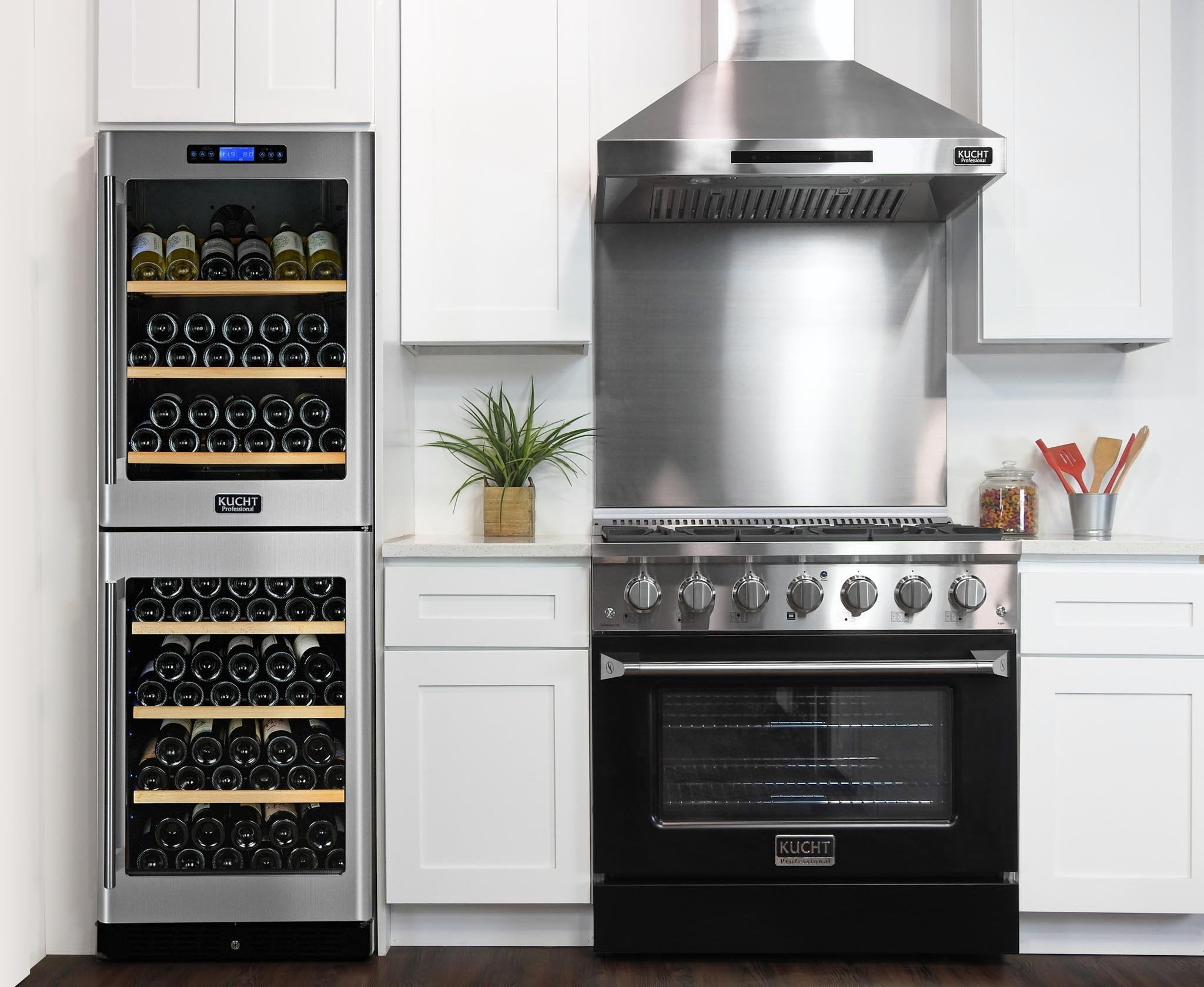 Black Kucht range with sealed burners and convection oven installed in kitchen