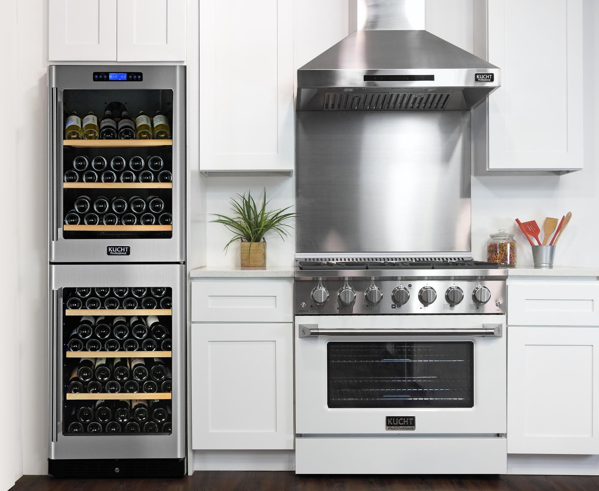 White freestanding range oven with burner knobs and closed oven door
