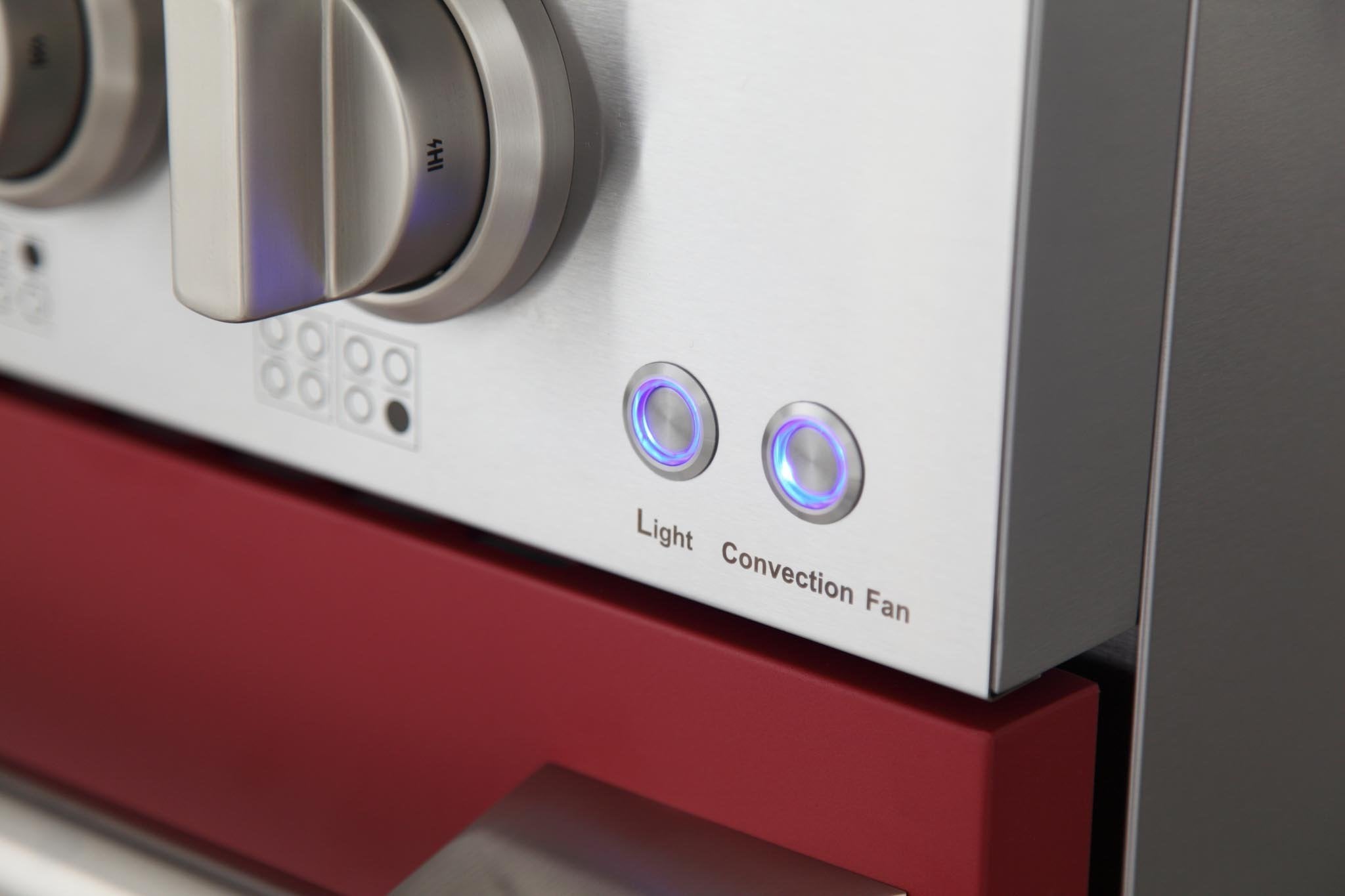 Stainless control panel on a red gas range with illuminated blue convection and light icons