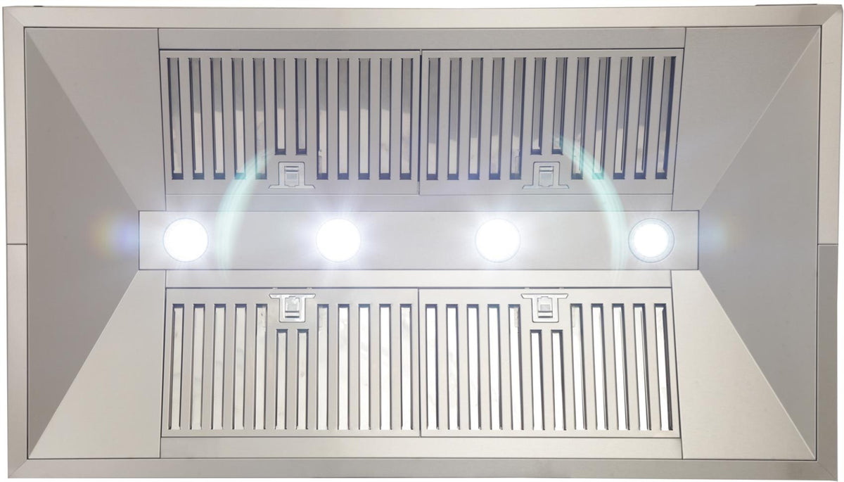 Kucht stainless steel range hood underside with lit lights, baffle filters, and vents