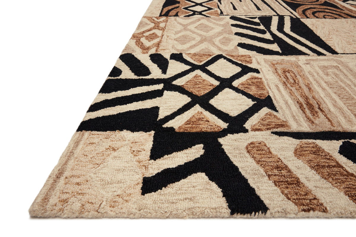 Contemporary hand-tufted rug corner with bold geometric shapes in black, beige, and brown.