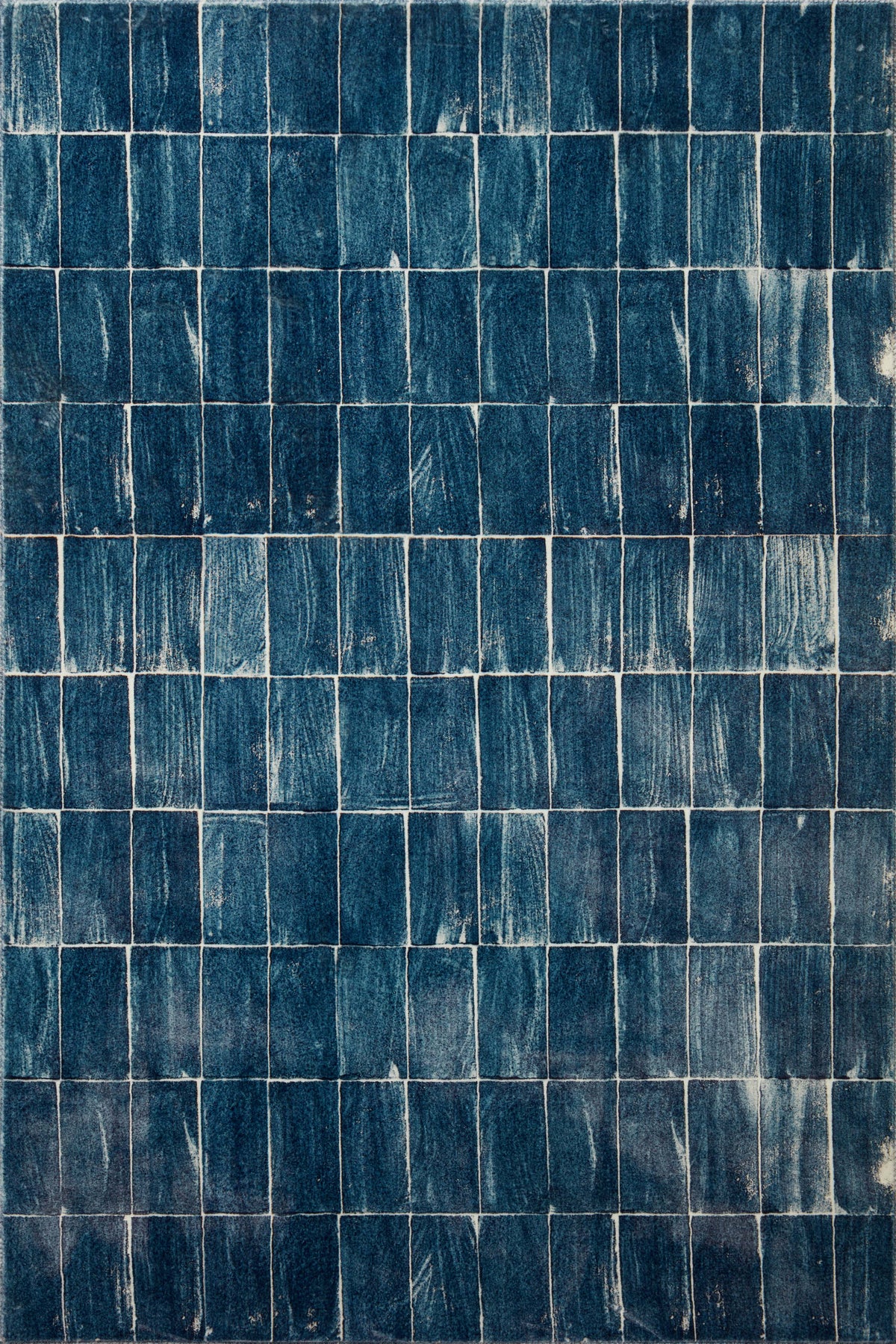 Denim and ivory tiled grid rug pattern with distressed lines