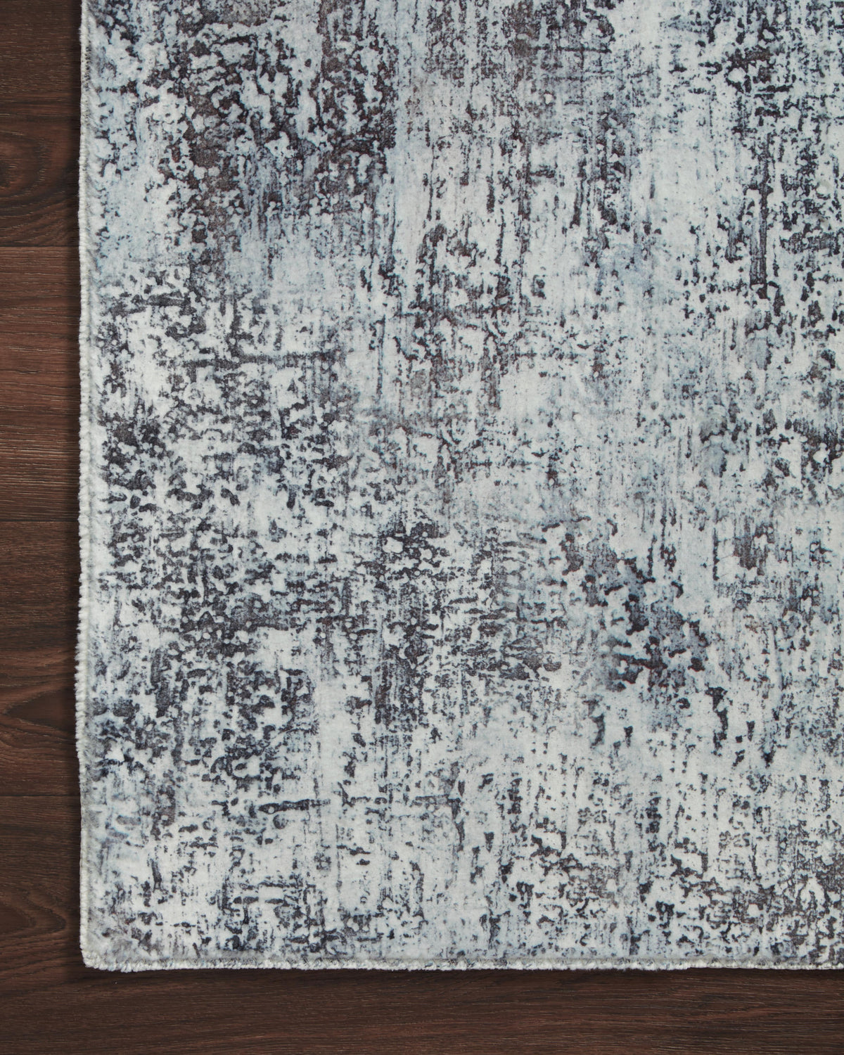 Contemporary hand-tufted rug with distressed gray and graphite pattern, squared border