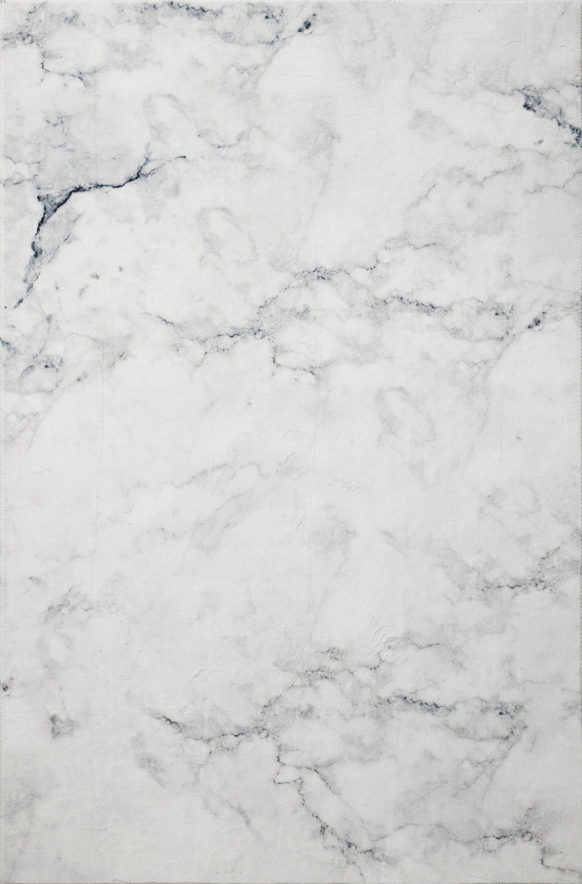 Ivory hand-tufted rug close-up with blue-gray marble print