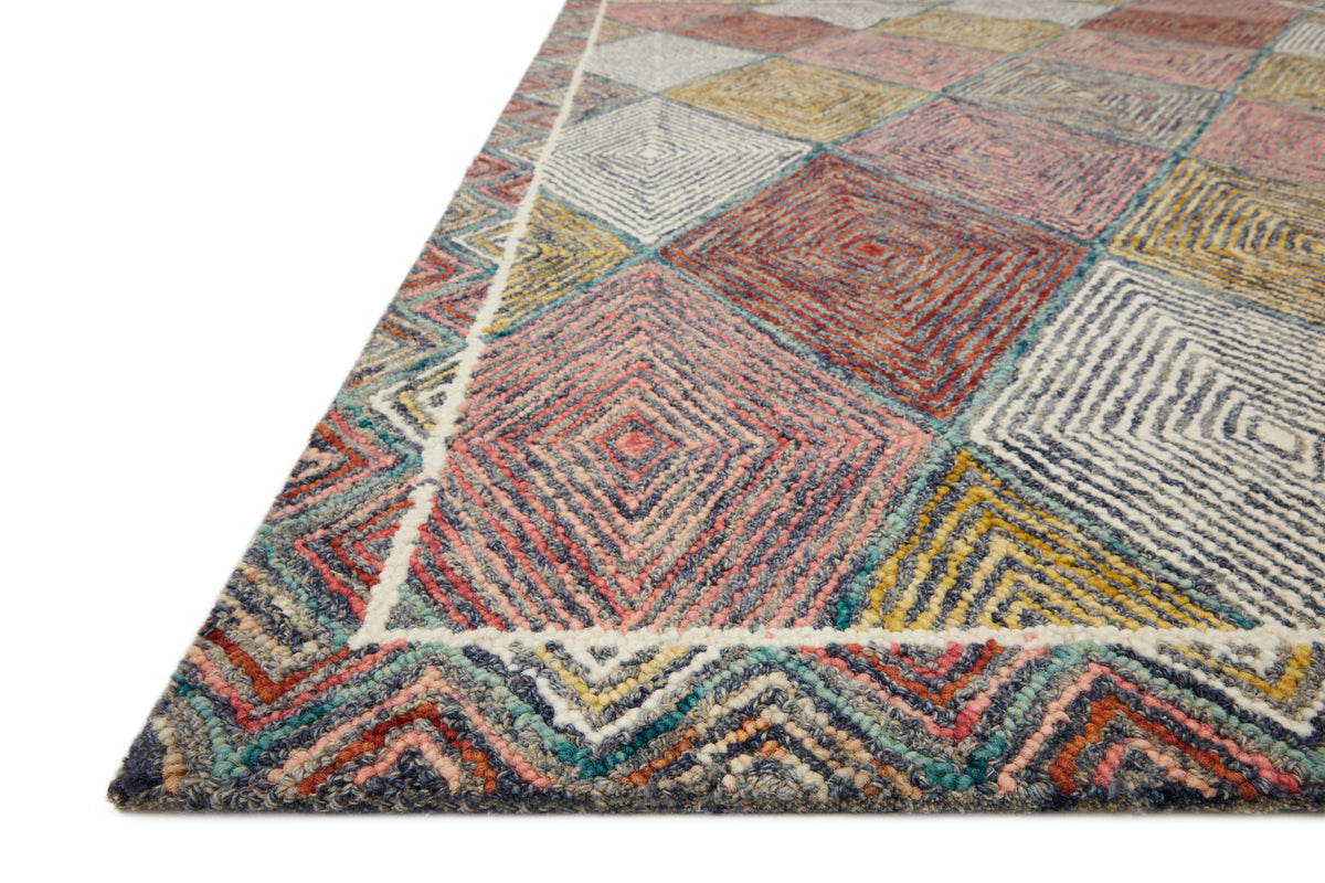 Multicolor hooked rug corner with zigzag diamond pattern in coral, teal, and gray