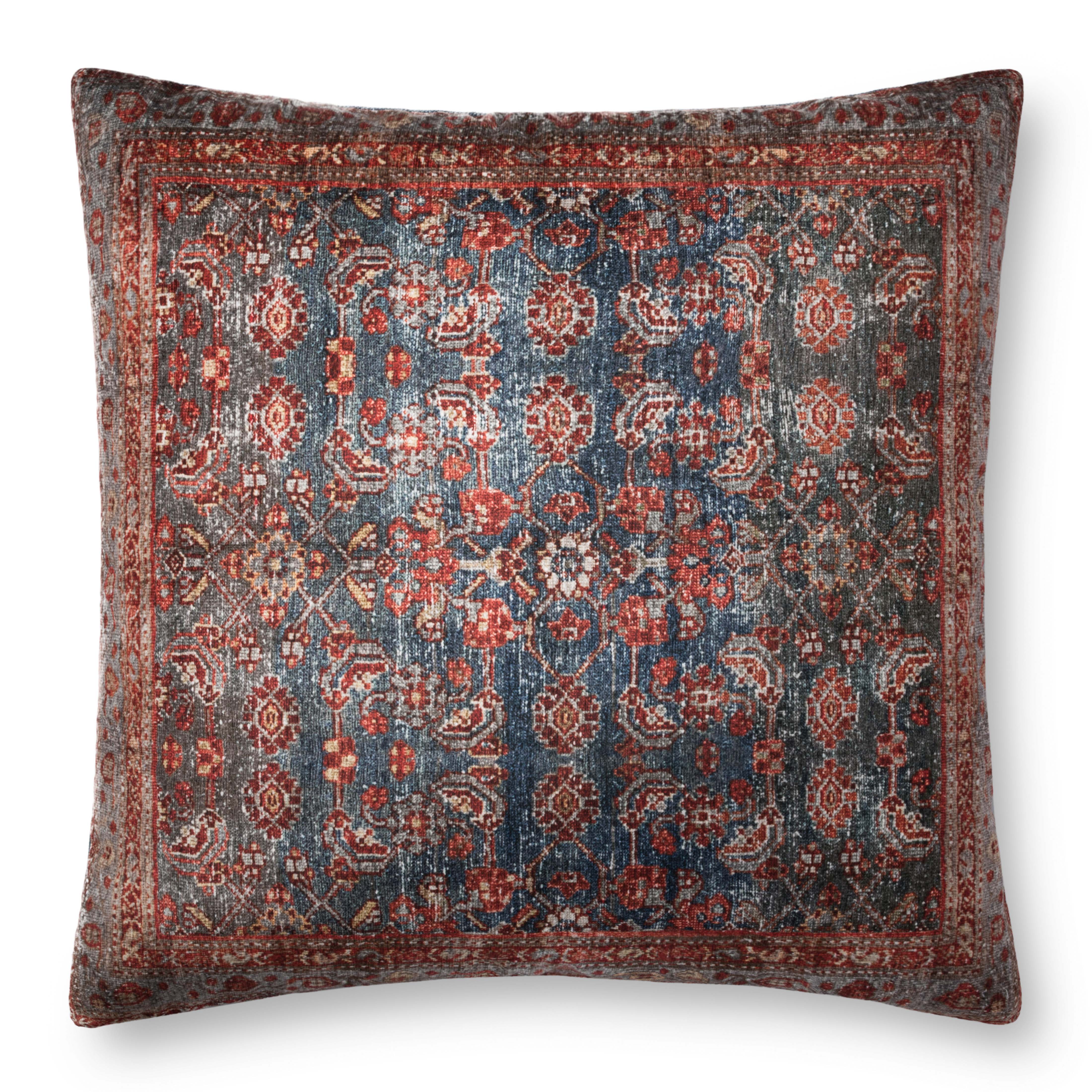 Geometric multicolor throw pillow with bordered motif and piped edge