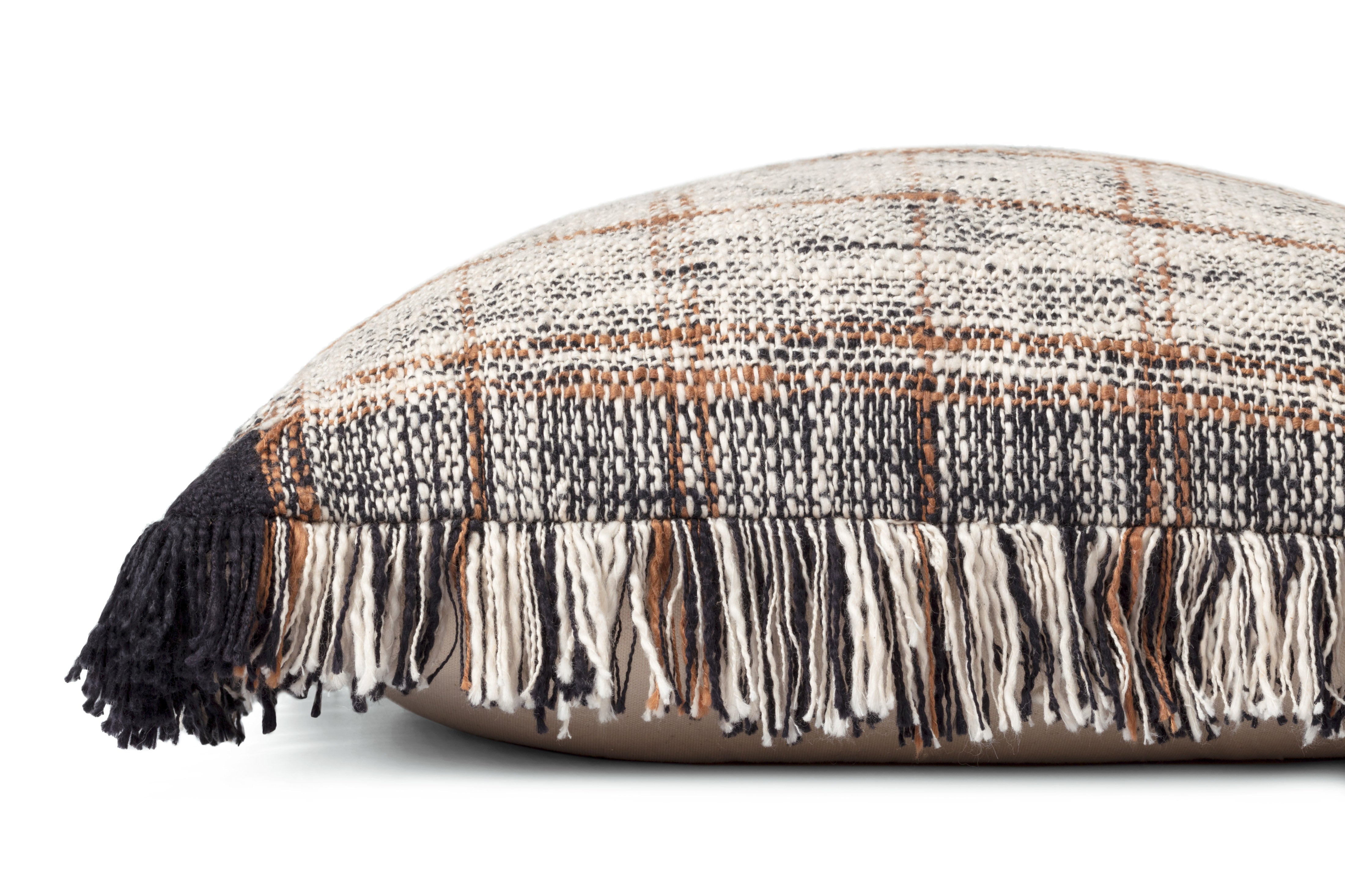 Down-filled pillow with black base, natural plaid top, and fringed edge detail