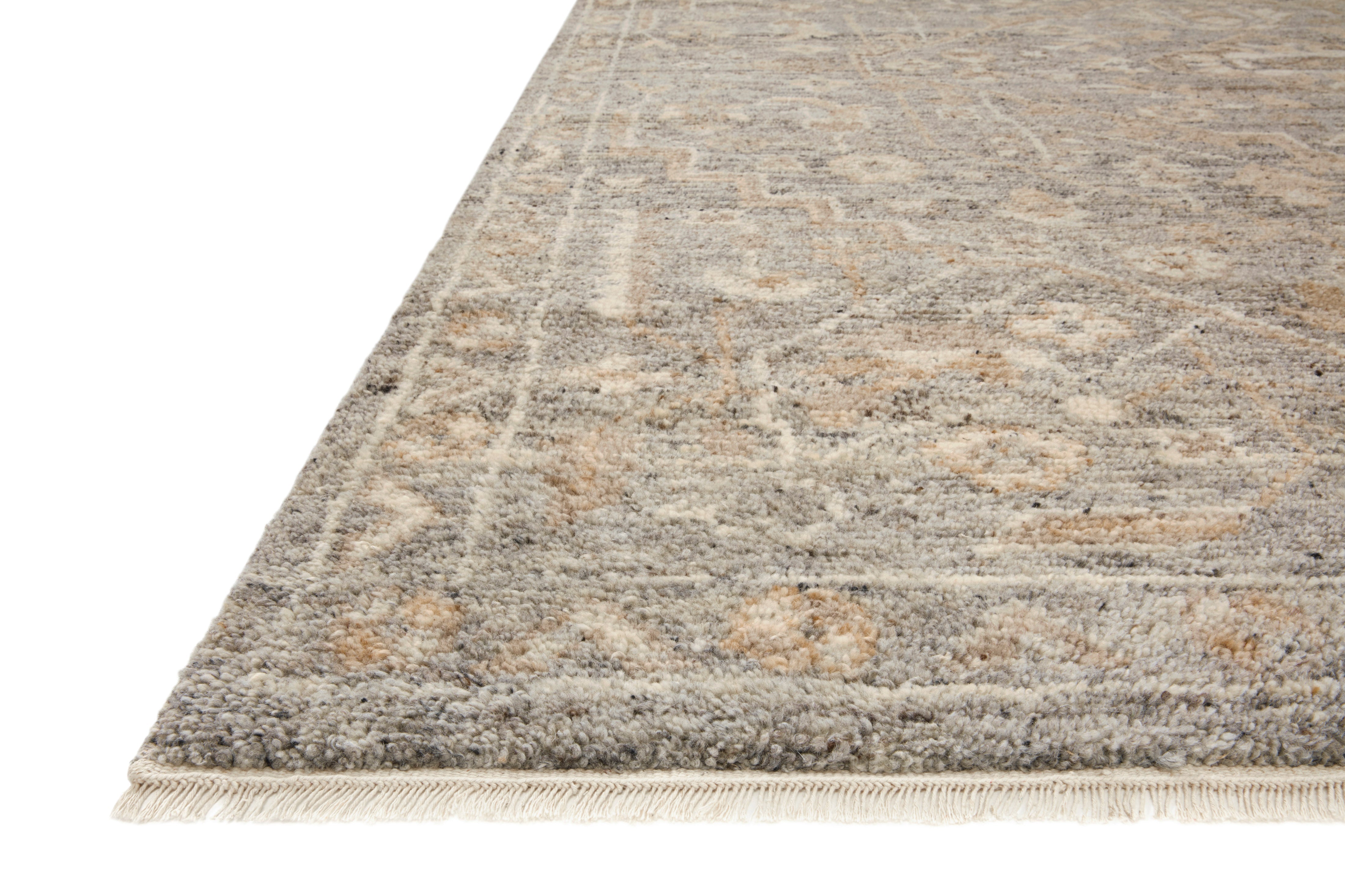 Traditional wool pile hand-knotted rug in gray-brown distressed pattern, fringed edge