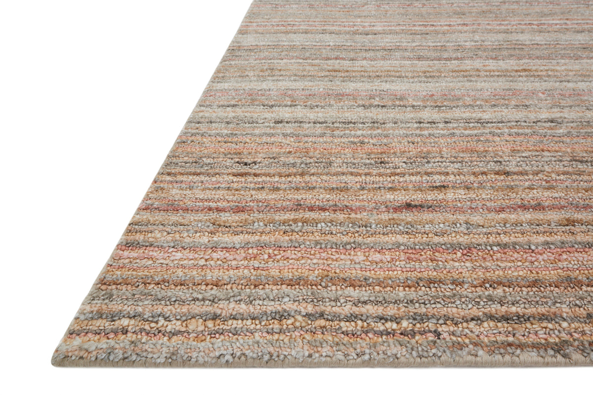 Hand-loomed transitional rug corner showing woven texture and silver-blush stripe pattern