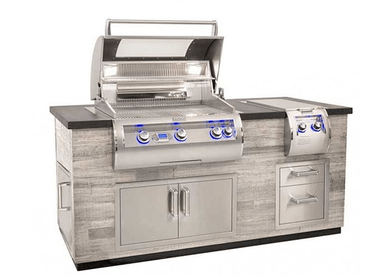 Reclaimed wood outdoor grill island with open hood, stainless warming racks, and cabinet drawers