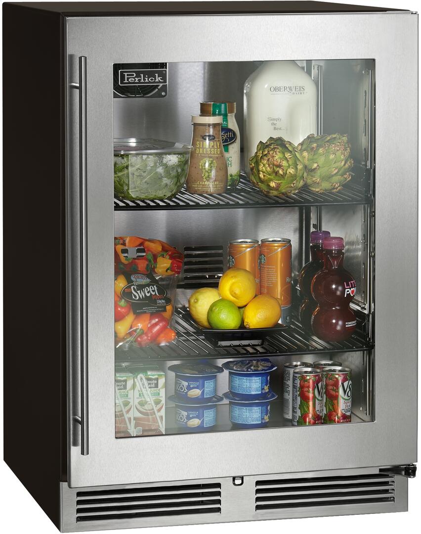 Stainless steel built-in refrigerator with glass door and stocked interior shelves