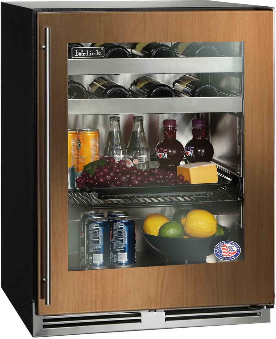 Built-in beverage center with open glass door, wood cabinet, assorted beverages inside