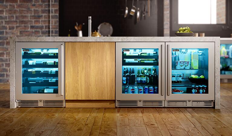 Two stainless compact refrigerators with glass doors, set side-by-side in kitchen