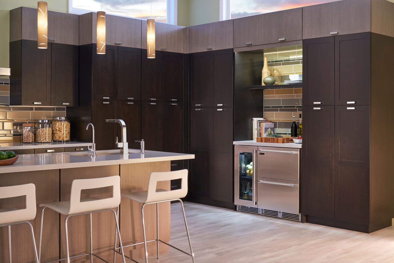 Stainless built-in freezer drawer in kitchen cabinetry