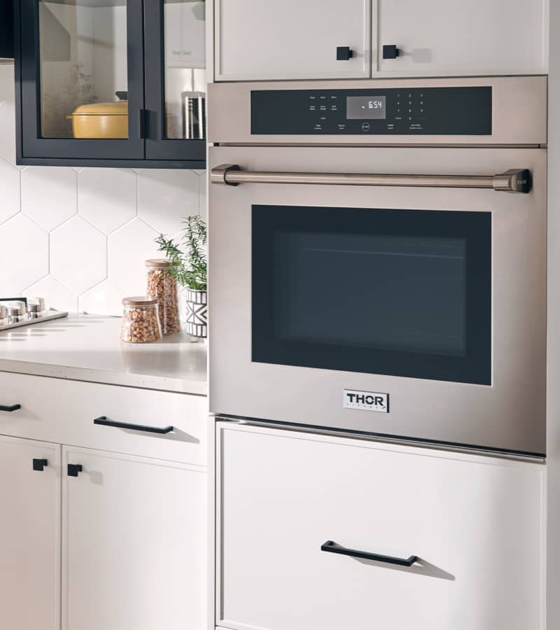 Stainless steel wall oven with black glass door and digital control panel, Thor