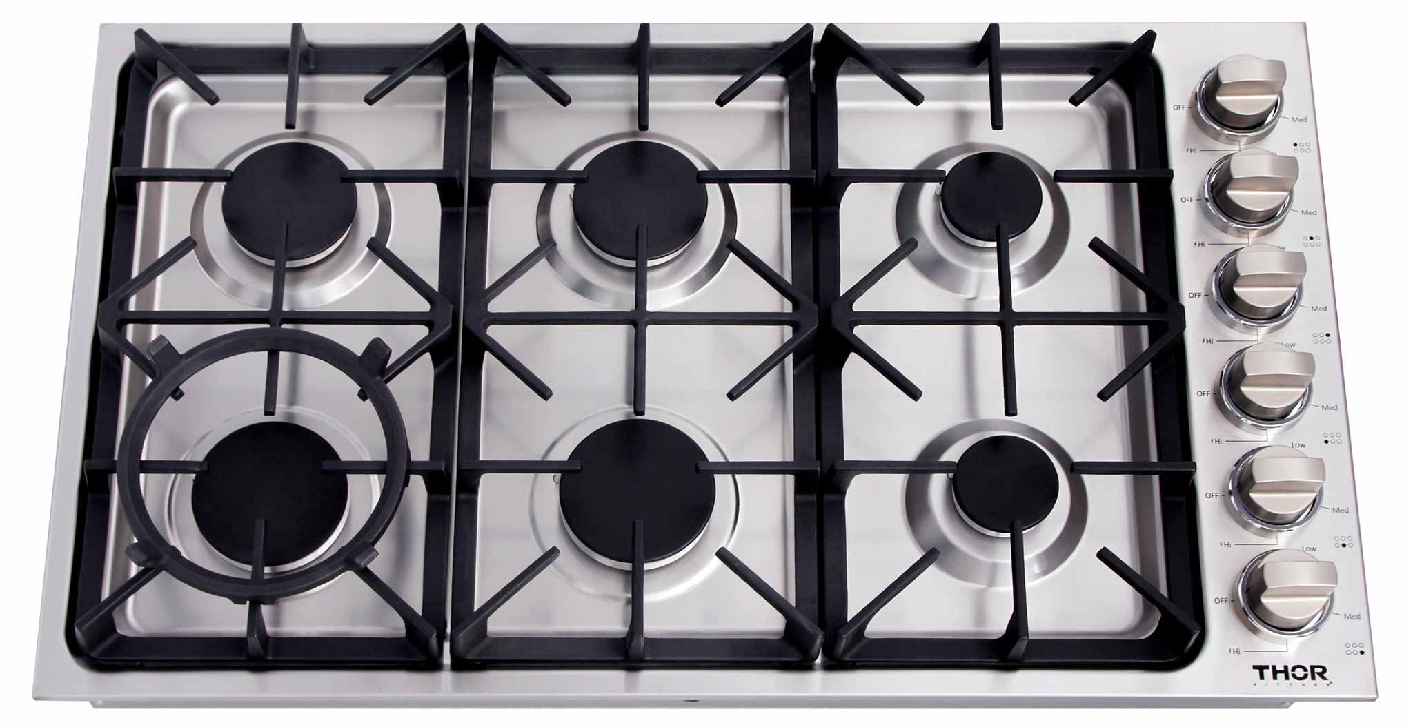 Stainless steel gas cooktop with six burners, black grates, and control knobs