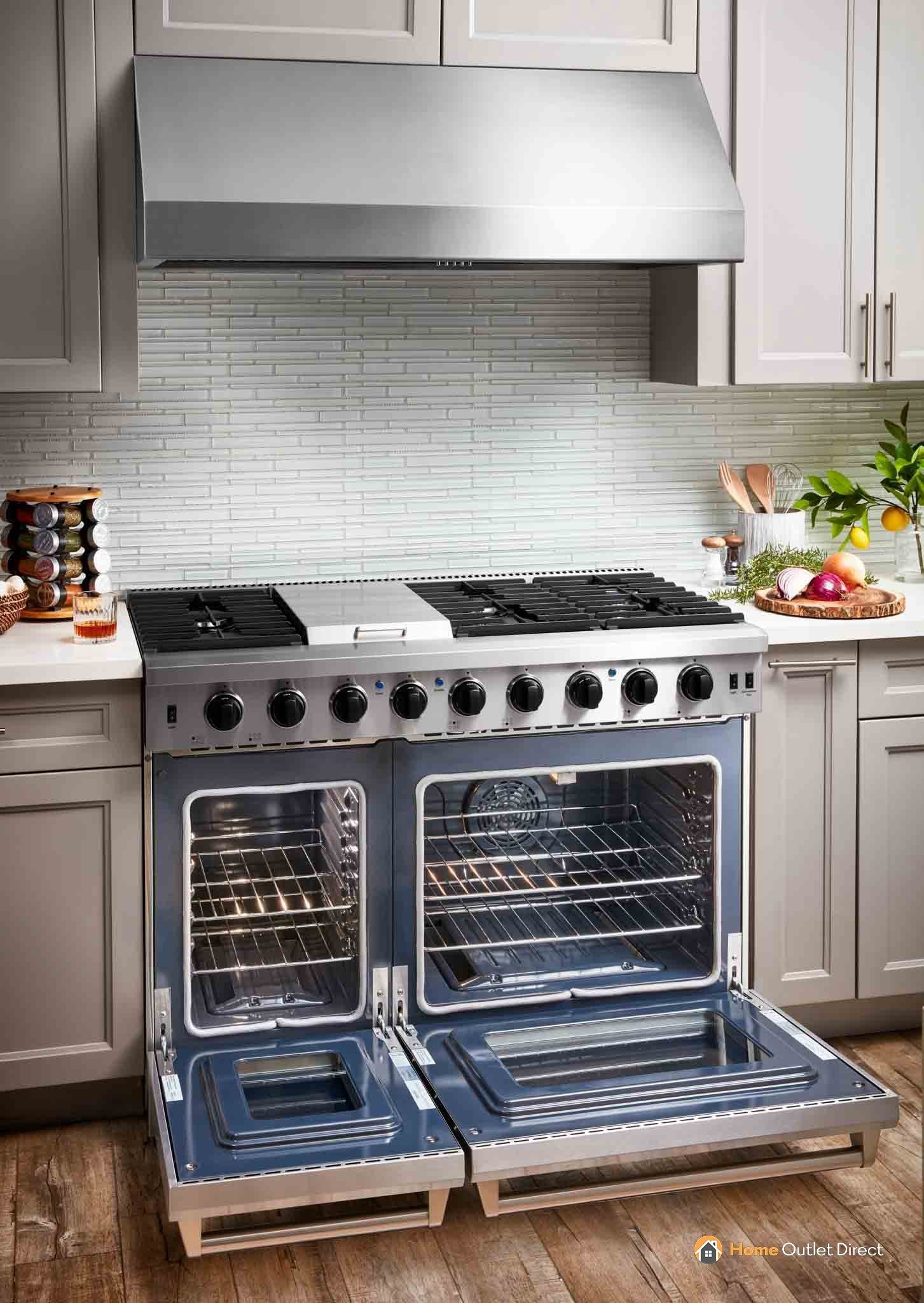 Stainless steel double oven gas range with both oven doors open and gas burners
