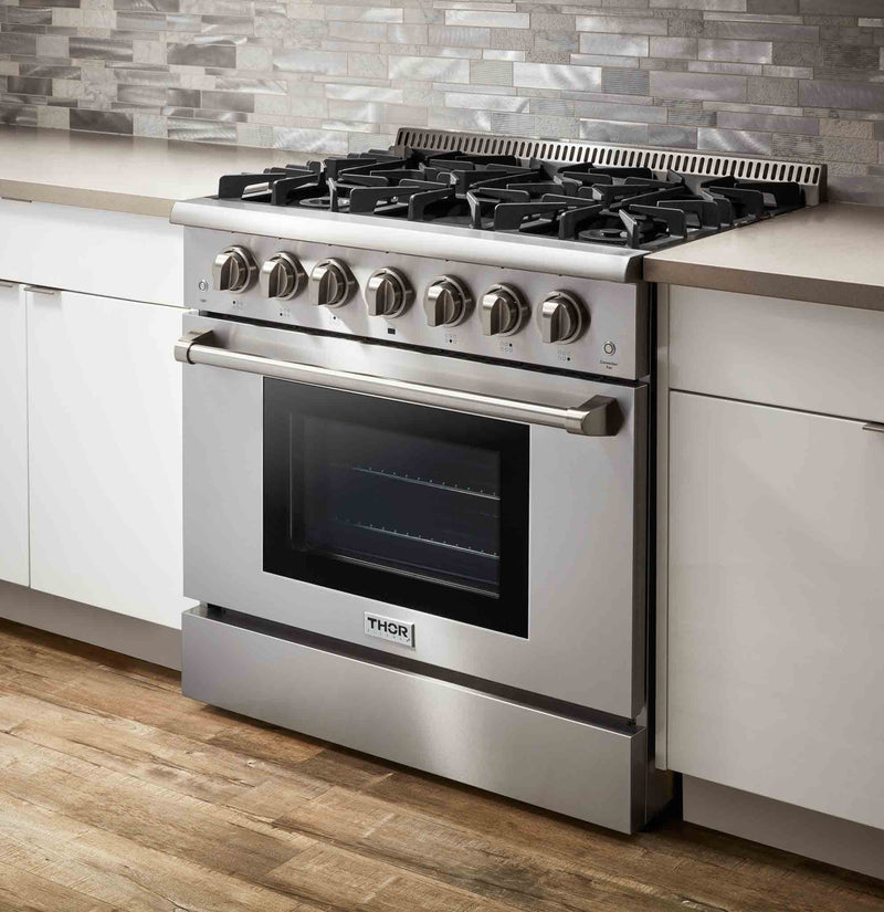 Thor Kitchen 5-Piece Pro Appliance Package - 36" Gas Range, French Door Refrigerator, Wall Mount Hood, Dishwasher, and Microwave Drawer in Stainless Steel Appliance Package Thor Kitchen 