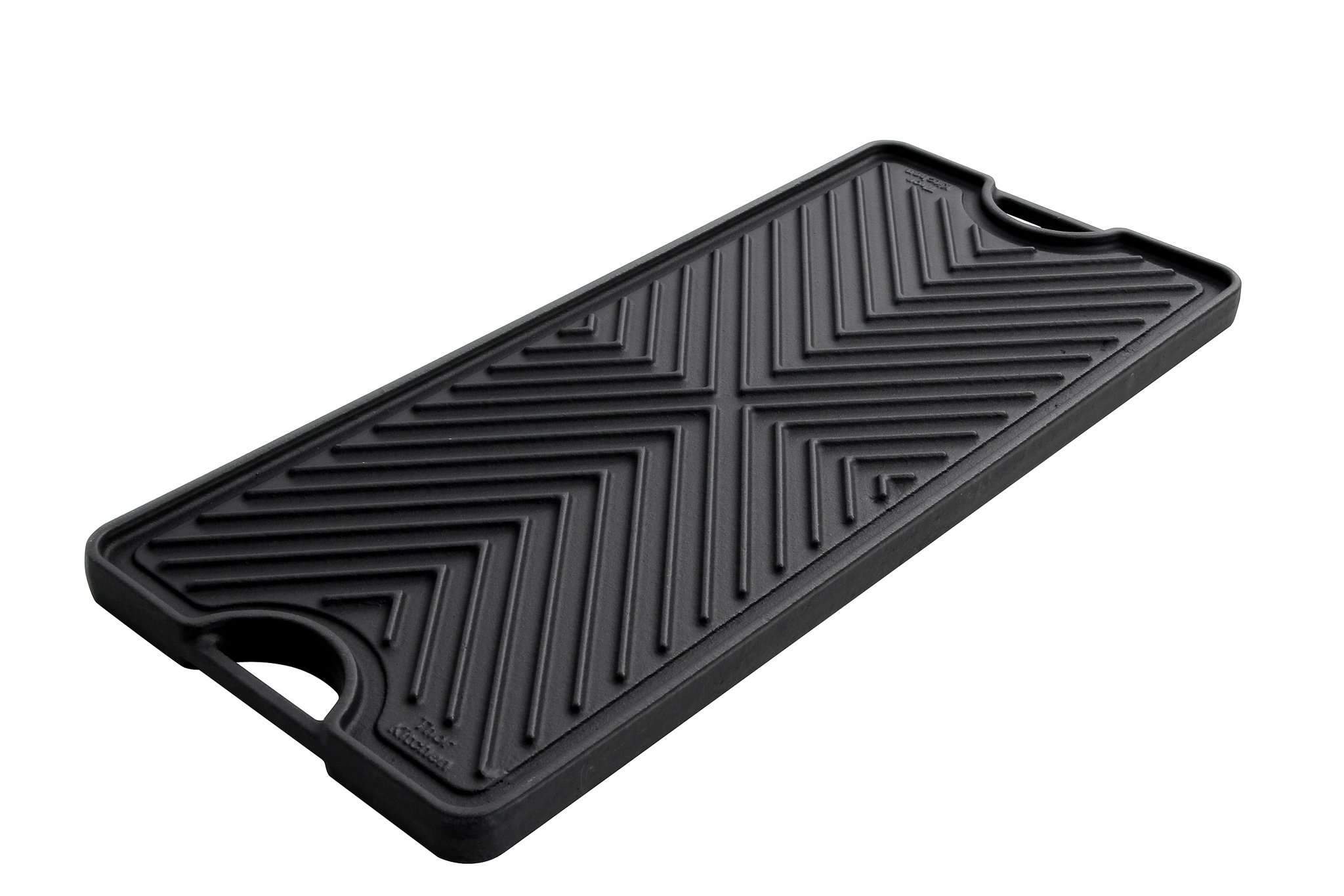 Black cast iron reversible griddle with raised chevron grill pattern and side handles
