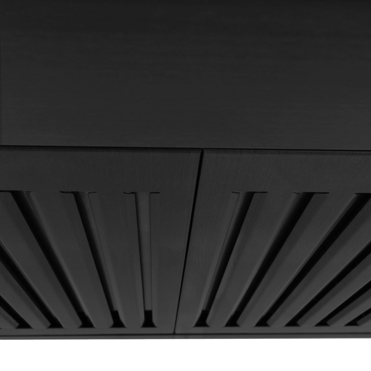 Close-up of black baffle filter slots on the underside of range hood