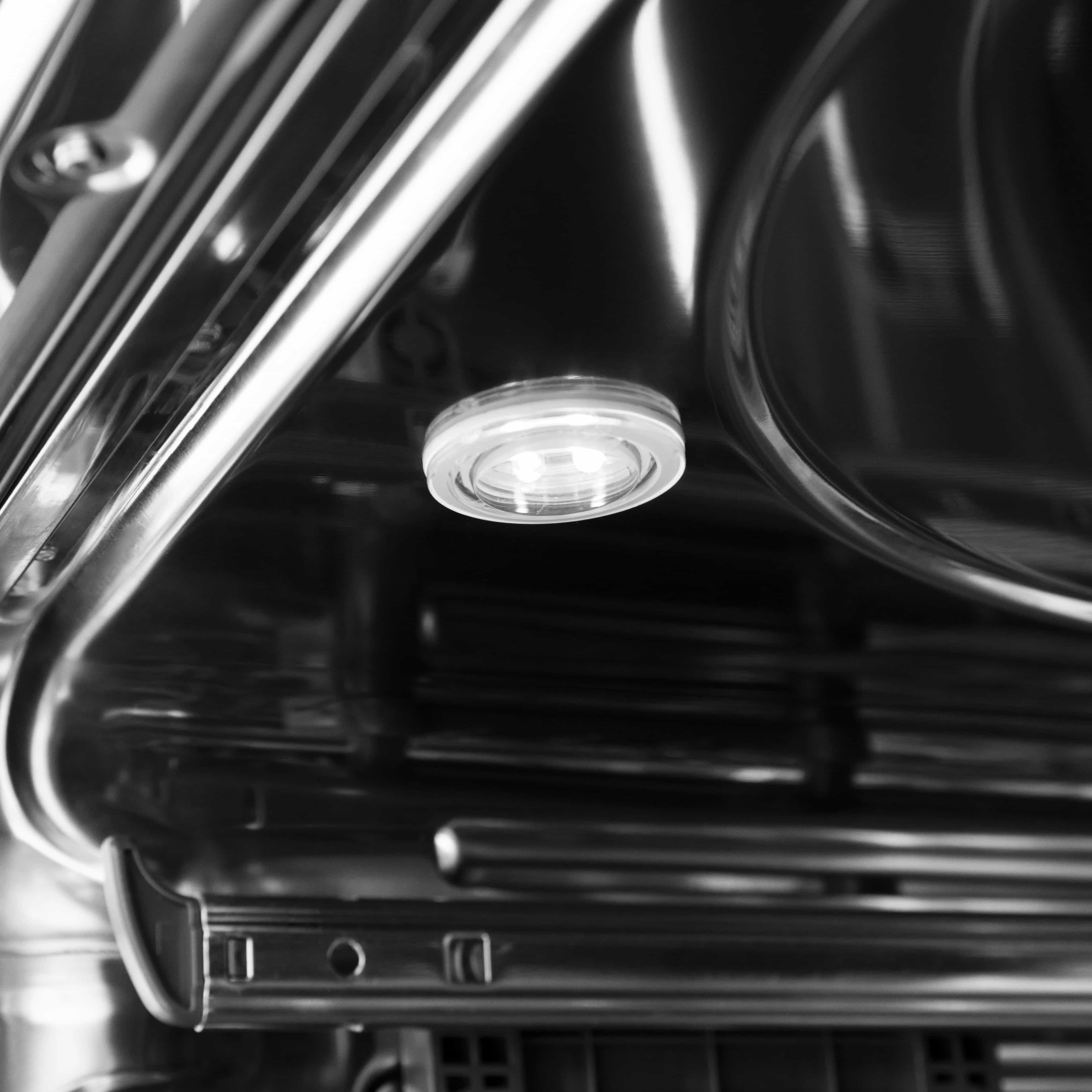 Stainless oven interior with recessed light and front edge controls